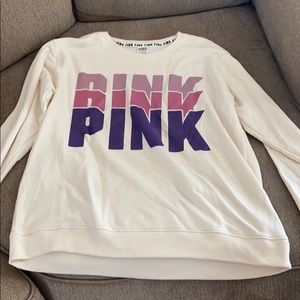 A white/cream colored sweater from Pink.